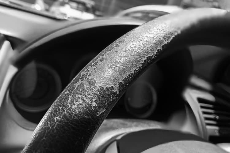 Side-by-side comparison of protected vs. unprotected dashboard after summer exposure